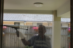 Hard at work window cleaning at Caloundra.